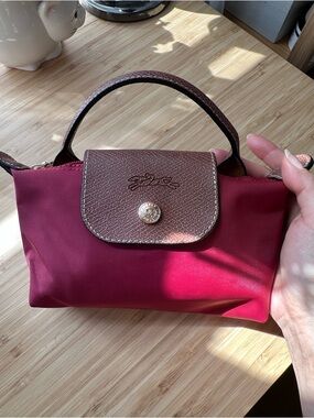 Longchamp le pliage mini tote bag 
Dark red color